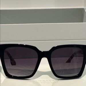 New in Box Burberry Black Lense Luxottica Frame with Nova Check handles.